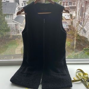 Black sweater vest